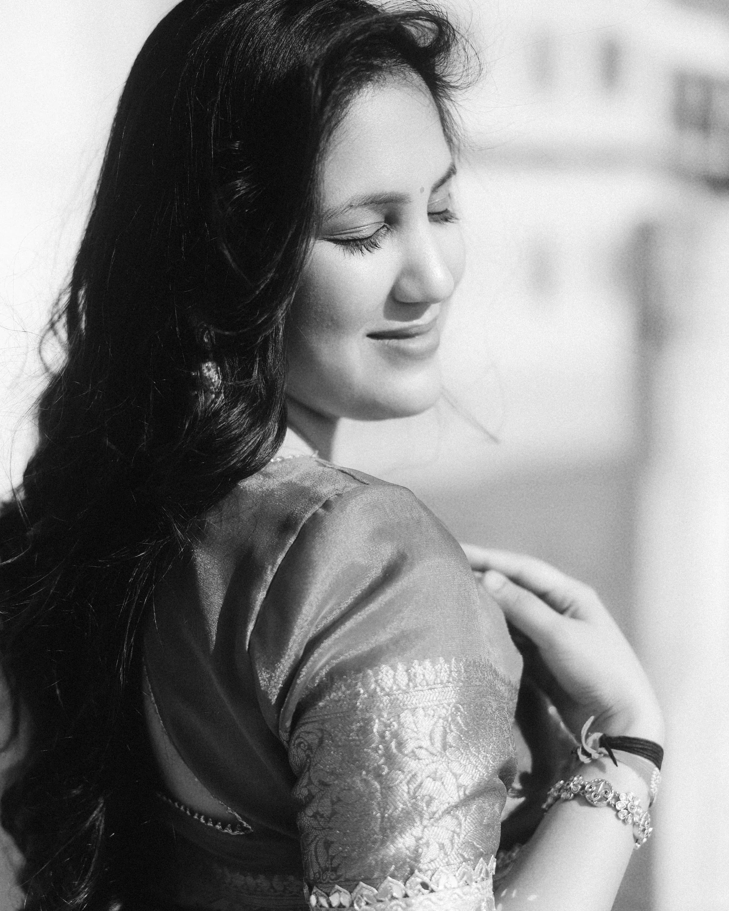 A bride in a black-and-white portrait
